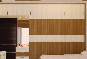 Luxury wooden wardrobe crafted by top interior designers in Chennai