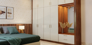 Functional wardrobe interiors with smart storage by interiors in Chennai